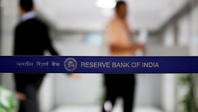 RBI Governor warns banks, NBFCs over slapping extra fees on customers