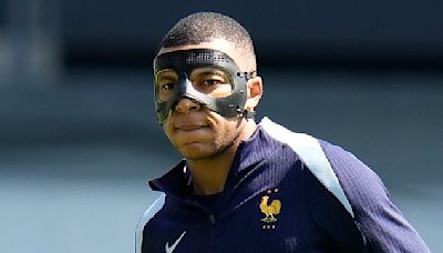 Kylian Mbappe is struggling with his face mask claims Didier Deschamps