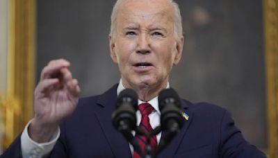 Biden says the US is rushing weaponry to Ukraine as he signs a $95 billion war aid measure into law