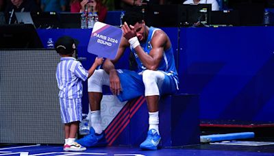 NBA star Giannis Antetokounmpo cries with sons in emotional scene after helping Greece reach Olympics