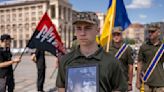 Ukrainian troops pay last respects to Briton killed in clash with Russian forces