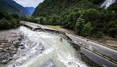 Switzerland floods: One dead and search continues for others as resort cut off