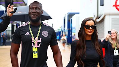 Maya Jama and Stormzy walk the paddock ahead of Formula One Grand Prix