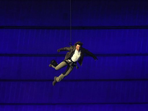 Tom Cruise Skydives Toward L.A. 2028 in Paris Olympics Handover Ceremony