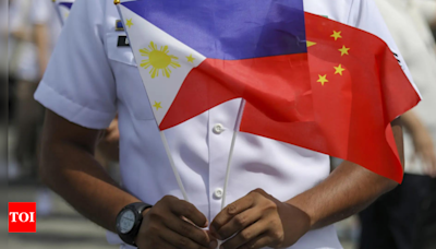 China, Philippines agree on 'provisional arrangement' for South China Sea resupply missions, Manila says - Times of India