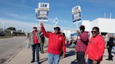 On the Ohio-to-Michigan highway, US auto workers drive for solidarity