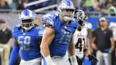 Lions defensive lineman John Cominsky carted off practice field with knee injury