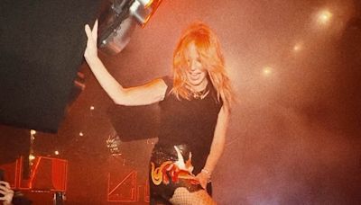 Kylie Minogue dances on tables during wild night out in Ibiza