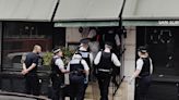 Police move in to evict squatters from Diana's favourite restaurant