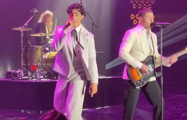Joe Jonas Surprises Guests by Joining Brother Nick Jonas Onstage at the 30th annual AmfAR Gala in Cannes