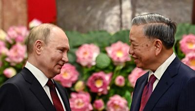 As Putin visits, Vietnam says will boost ties with Russia for global peace