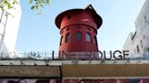 Windmill sails fall from iconic Paris cabaret club Moulin Rouge