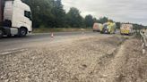 A14 partially blocked after lorry crashes into barrier