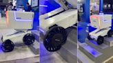 Stairs are no obstacle for this delivery bot's squishy wheels