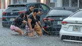 All the rain in Miami and Fort Lauderdale did that? Take a look at what people posted