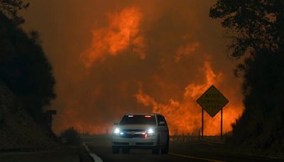 Lightning could worsen wildfire east of LA already threatening 35,000 homes and buildings