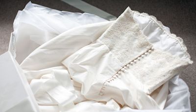 Bride Unboxes Mom's Vintage Wedding Dress With Hopes of Wearing It on Her Big Day—Only to Discover a Stranger's Gown