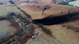 Firm: Faulty weld, pressure on pipe led to Kansas oil spill