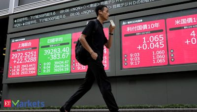 Asian stocks edge higher before Powell’s testimony: Markets wrap - The Economic Times