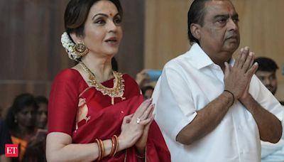 Mukesh Ambani visits Sonia Gandhi's residence to hand over son's wedding card