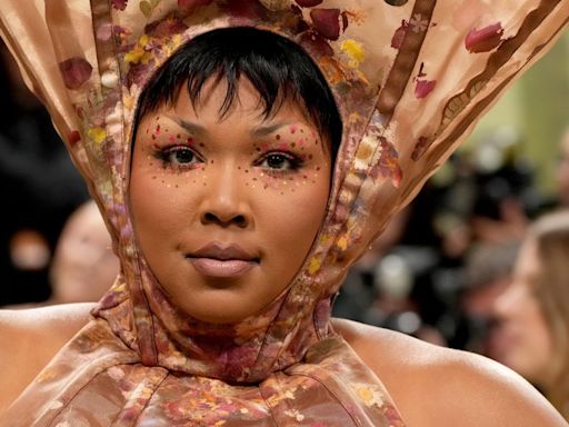 Lizzo Calls Critics ‘Fatphobic’ After Met Gala Outfit Compared To Foreskin, Menstrual Cups