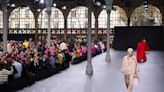 Glitzy Valentino show sees Paris Fashion Week at fever pitch