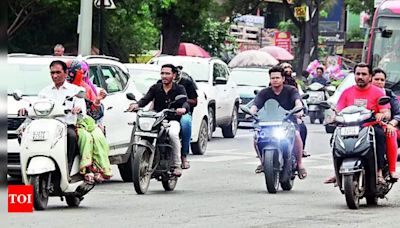 Ahmedabad Traffic Police Crack Down on Helmet-Less Riders Following High Court Order | Ahmedabad News - Times of India