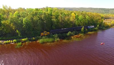 In Duluth, you can take a vintage train up the St. Louis River, then paddle back