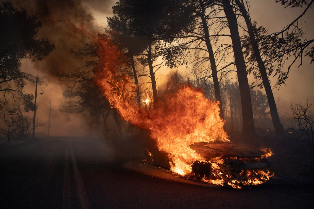 Major wildfire rages out of control on fringes of Greek capital; hundreds of firefighters deployed