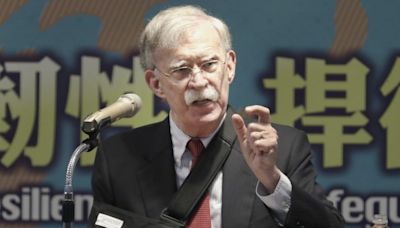 John Bolton dismisses link between prisoner swap and US election