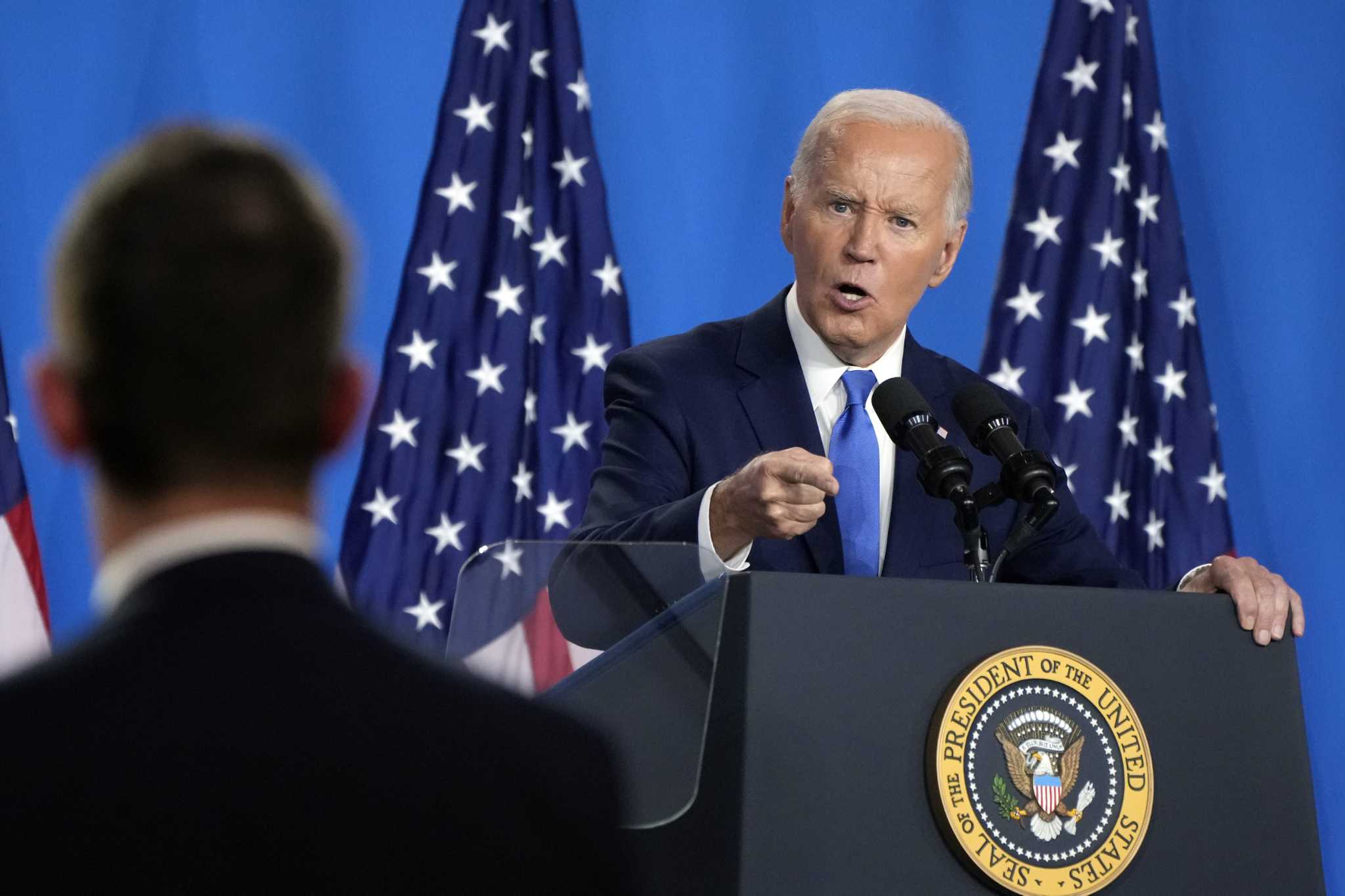 The Latest: Biden returns to the campaign trial following high-stakes news conference