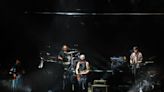 Bon Iver dazzles drenched Hinterland crowd on first day of Iowa music festival