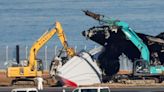 Watch: Crews continue clearing Japan Airlines wreck from Tokyo runway crash