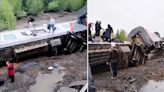 Two killed after tourist train derails and crashes into river