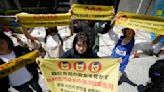 Dozens rally against Fukushima plant water release plan