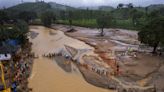 Rescuers search through mud and debris as deaths rise to 166 in landslides in southern India