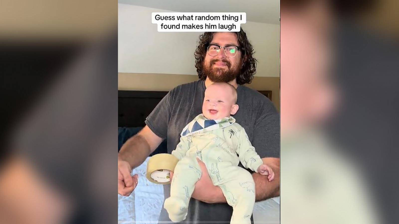 Dad makes baby laugh hysterically with the sound of duct tape