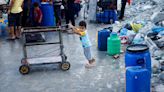 Palestinian children dream of school in Gaza water queues