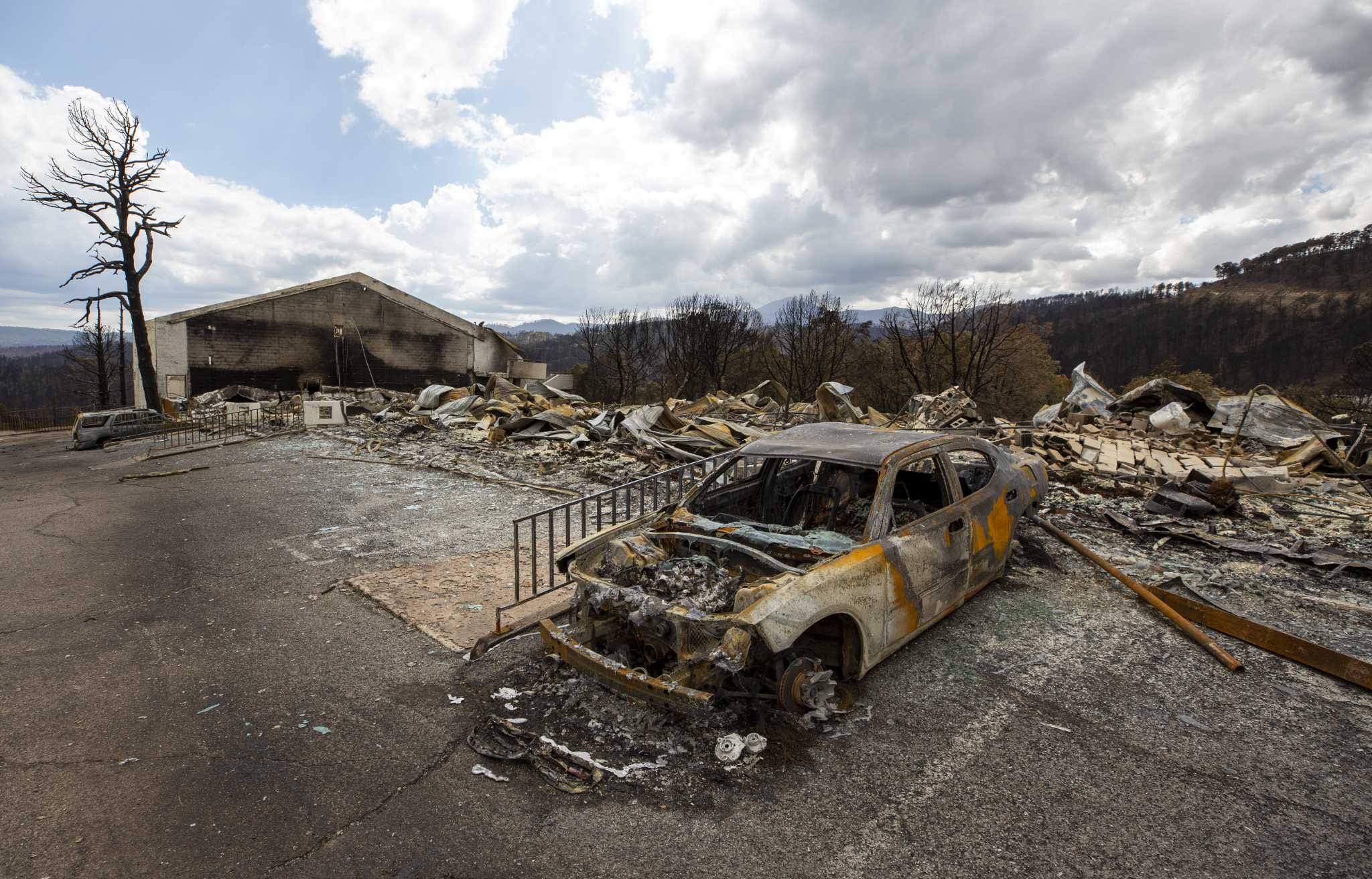 Rains, cooler weather help firefighters gain ground on large wildfires in southern New Mexico