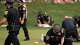 PGA Tour: Scottie Scheffler beats Tom Kim in Travelers Championship play-off after protesters disrupt 72nd hole