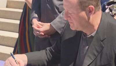 Gov. Jared Polis signs bill into law that clarifies occupancy limits in cities across Colorado