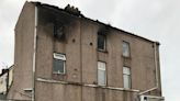 Child and teen arrested over derelict building fire