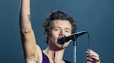 Harry Styles pauses his packed stadium concert to let a pregnant fan use the bathroom before helping her choose a baby name