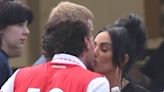 Katie Price shares a kiss with boyfriend JJ Slater at football match