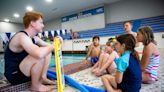 Holland Aquatic Center joins pools across the globe in 'World's Largest Swim Lesson'