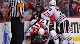 Blackhawks rookie Connor Bedard departs after big hit by Devils defenseman Brendan Smith