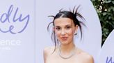 Millie Bobby Brown channels Blair Waldorf with XL hair extensions and preppy headband