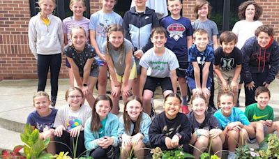 Multiage class upgrading Williams Elementary courtyard in Mattoon