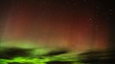 A solar storm is hitting Earth this weekend, bringing views of the northern lights to the U.S.