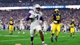 TCU reaches College Football Playoff title game with defeat of Michigan in wild Fiesta Bowl